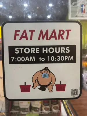 a fat man store hours sign in a store at 2BR Resort Type condo w city view Sheridan in Manila