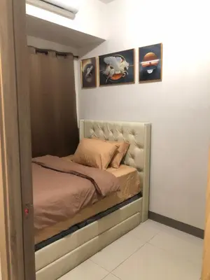 a bedroom with a bed in a room at LNicoles Pad in Manila