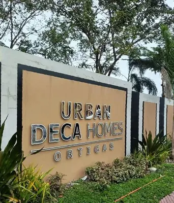 a sign that reads urban deega homes office at 1 BR Nordic Suite with Netflix, Disney, Prime in Manila