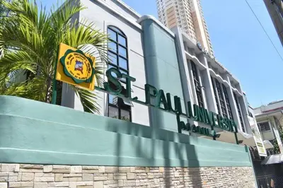 a building with a sign in front of it at 19f w NFLIX & BALCONY NEAR ROB, PGH, ACC USM&SLMC in Manila