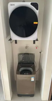 a computer monitor sitting on top of a printer at Spacious Apartment Hotel near City of Dreams, Airport, MOA, Okada, Ayala Malls, and Solaire Casino with free 5 pool access in Manila