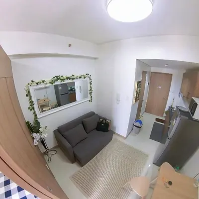an overhead view of a living room with a couch at MAKATI - Lush Residences in Manila