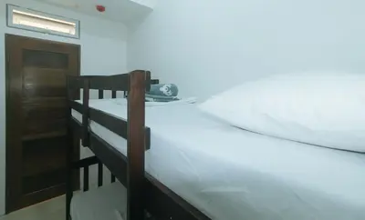 a pair of bunk beds in a room at Stay Manila Hotel by RedDoorz in Manila