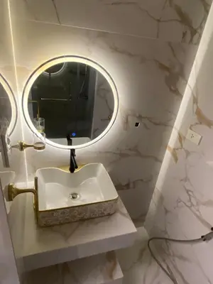 a bathroom with a sink and a mirror at Fairy Dust Sky Suite By Crib2GO in Manila