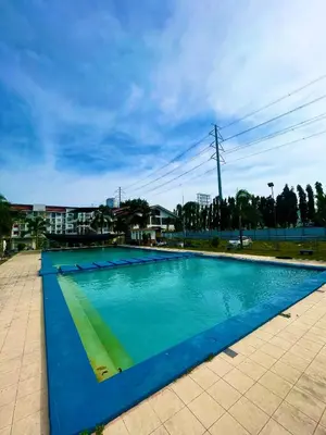 a swimming pool with blue water in a city at Chushers place in Santa Rosa