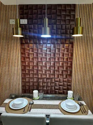 a table in a restaurant with two plates on it at AZURE BICUTAN -MIAMI TOWER 6 Floor in Manila