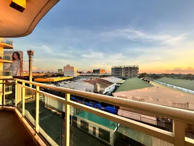 a view of a train station from a balcony at AZURE BICUTAN -MIAMI TOWER 6 Floor in Manila