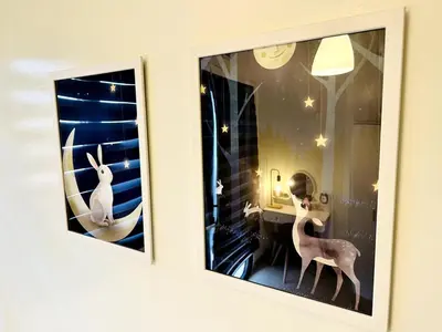 two windows in a room with fake animals on them at OREO1232 House in Manila