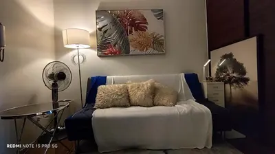 a room with a bed with two pillows on it at Air Residence Tower B RM 445 Elegant and cosy Makati condoxd in Manila