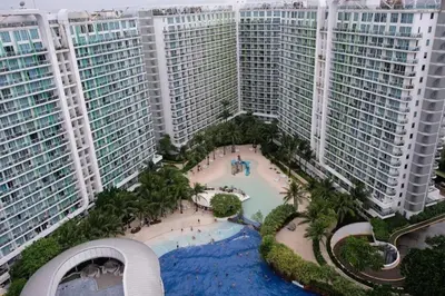 an aerial view of a resort with tall buildings at Home Sweet Home - Azure in Manila