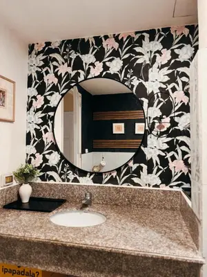 a bathroom with a sink and a mirror at Moody Space near NAIA TERMINALS in Manila