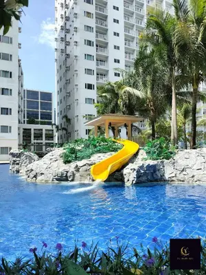 a slide in the water at a resort at Newly opened near MOA & Airport with PS4 and karaoke in Manila