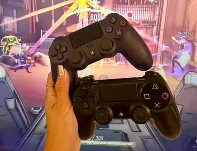 a person is holding a video game controller at Azure Urban Resort Staycation By Yana in Manila