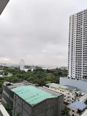 an overhead view of a building and a ferris wheel at ck staycation coast residence in Manila