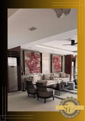 a living room with a couch and a table and chairs at Celebrity Haven in Manila
