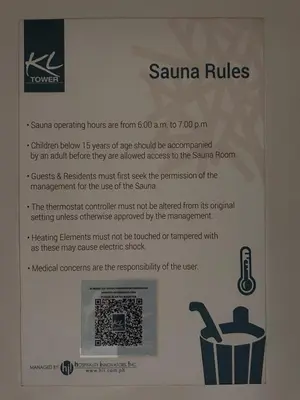 a sign for the sauna rules on a wall at Cozi Makati Executive Studio balcony in Manila