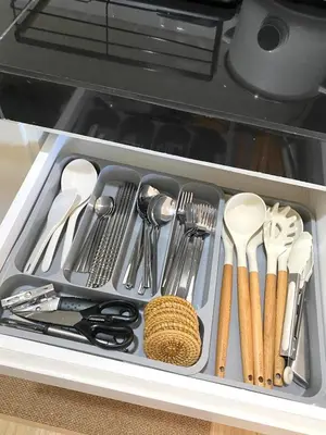 a drawer filled with utensils in a kitchen at The Hive Staycation - SMDC Hope Residences in Trece Martires