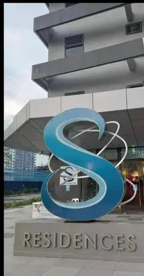 a building with a sign that readsresidents at S-Residence Staycation IKEA,MOA,PICC in Manila