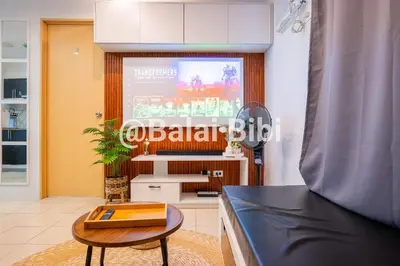 a living room with a table and a window at Balai Bibi at Urban Deca Homes Ortigas 3Br in Manila