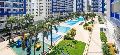 an aerial view of a water park in a city at RE Staycations in Manila