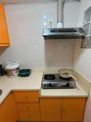 a kitchen with a stove top in a kitchen at Marbella Tower 2 in Manila