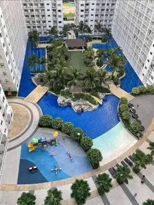 an overhead view of a resort with a swimming pool at Ethans Place in Manila