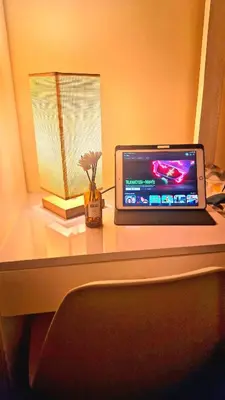 a laptop computer sitting on top of a desk at Veronica Grey's Staycation 2BR in Manila