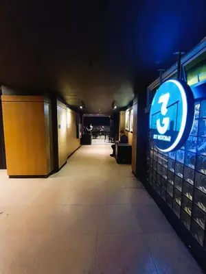 a hallway with a sign on the side of a building at Agate's Loft in Manila
