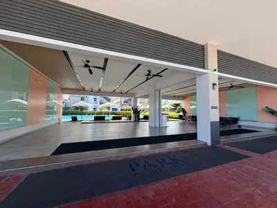 an empty lobby of a building with a parking lot at SMDC Park Residences Unit 202 in Ibaba