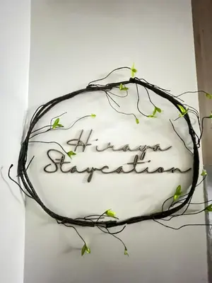 a cake with branches on top of it at Hiraya Staycation in Manila