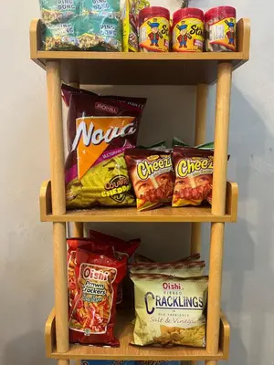 two shelves filled with different types of food at Hiraya Staycation in Manila