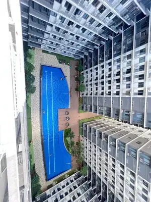 an overhead view of a building with a blue door at UNISTAY Shore 3 Tower 2 14 Flr w Bal in Manila