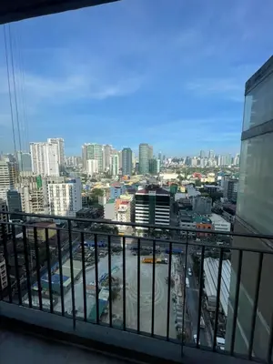 a view of a city from the balcony of a building at Antel Spa Residences 2505 in Manila
