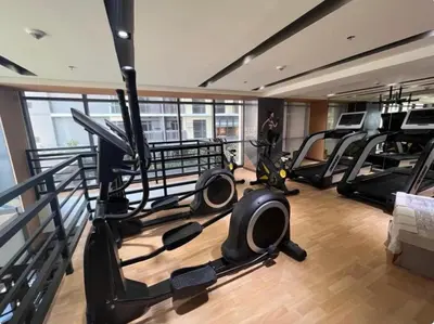 a gym with treadmills and elliptical machines at Okada Manila Gentry Manor Balcony 1br Unobstructed Scenic View in Manila