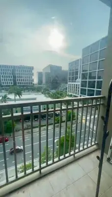 a view of a city street from a balcony at Shore Residences Pasay Balcony Studio Unobstructed View Near SM Mall of Asia in Manila
