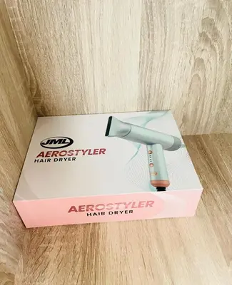 a razor in a box on a wooden table at Cozy condotel Field Residence in Manila