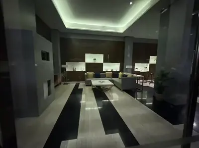 a living room with a couch and a table at JRM Staycation The Radiance Manila Bay Sunset with Pay Parking in Manila