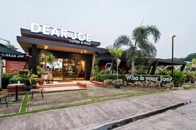 a store with a sign that says dartot coffee shop at Coho Staycation with Free swimming in Las Pinas in Manila