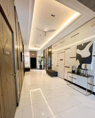 a hallway of an office building with a ceiling at RoVi,s Nook SMDC Charm in Manila