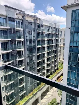 a view from the balcony of an apartment building at Rqui Family Room Pasay City in Manila