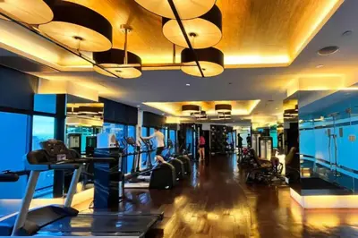 a gym with cardio equipment in a hotel at Green City View Apt in Gramercy Unit 3502 Makati w Netflix in Manila
