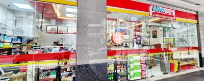 a store front of a grocery store at 14e BGC Unit 3 mins Walk to The Venice Grand Canal Mall Pet Friendly in Manila