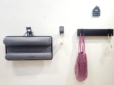 a table with towels and a fork and a knife at 14e BGC Unit 3 mins Walk to The Venice Grand Canal Mall Pet Friendly in Manila