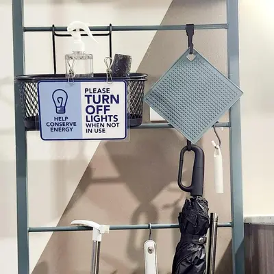 a shelf with a lamp and a sign on it at 11a Spacious Suite with Resort Amenities Free Parking with Washer Great for Long Stays in Manila