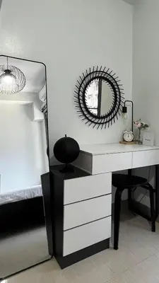 a mirror sitting on top of a desk in a room at Affordable Stay in MOA in Manila