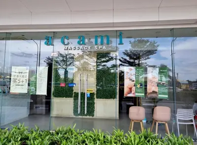 a store front with two chairs in the window at Affordable Stay in MOA in Manila