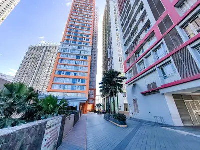 a street in a city with tall buildings at 1BR Condotel Suite at Sunshine100 City Plaza #SS03-1 in Manila