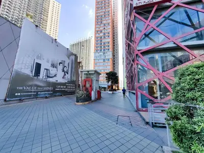 a street in a city with tall buildings at 1BR Condotel Suite at Sunshine100 City Plaza #SS07-1 in Manila