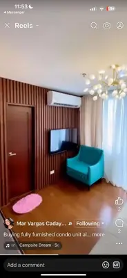 a picture of a room with a blue chair at Jhen in the City in Manila