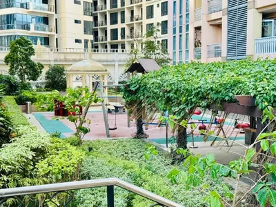 a garden with a gazebo in a city at Venice IG-Worthy , Netlfix Getaway walking distance to Mall in Manila